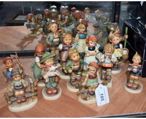 Goebel Hummel figures including Seated Boy, Drummer Boy, Little Hiker, Sweep, Seated Girl on Fence, etc; others, similar (14)