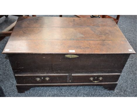 A late 18th century oak mule chest, hinged rectangular top above a pair of short drawers, bracket feet, 88cm wide