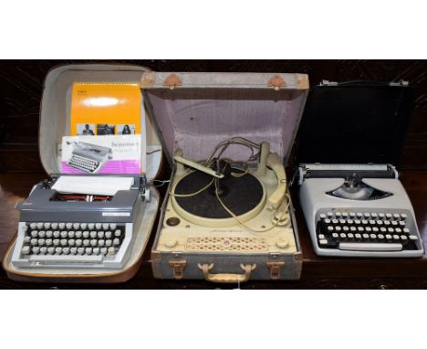 A vintage Regentone Handy-Gram portable record player, variable Monarch BSR deck; a 1960's Beaucourt Reporter typewriter, wit