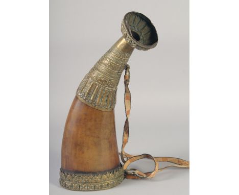A LARGE 19TH CENTURY BOVINE HORN BRASS MOUNTED POWDER FLASK, 41.5cm long.