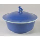 A CHINESE POWDER BLUE GLAZE BOWL AND COVER, the cover with molded bird finial, bearing Yongxheng