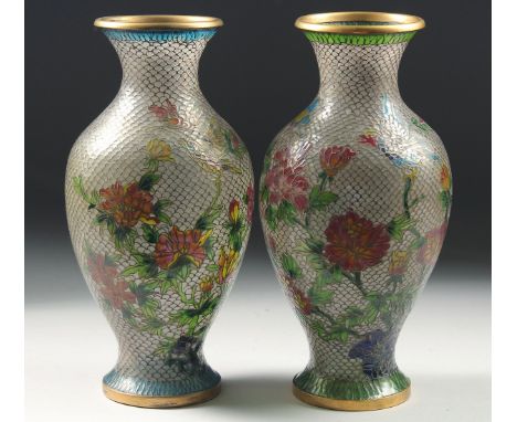 A PAIR OF CHINESE GLASS CLOISONNE VASES, decorated with colourful glass and wirework flowers with bird and butterfly on a sca