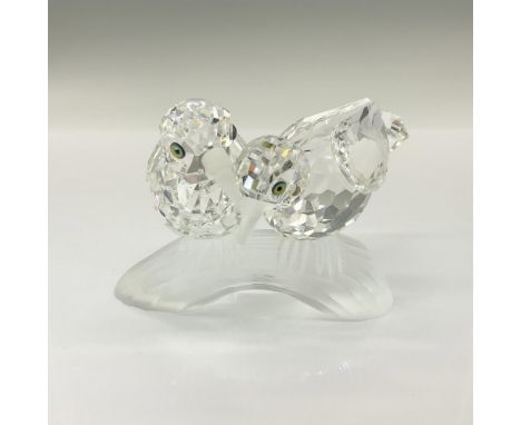These two turtledoves are crafted from clear crystal with frosted crystal beaks, perched together on a frosted crystal tree t