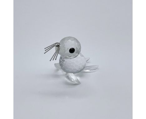 Part of the Kingdom Of Ice And Snow collection. A mini clear crystal seal pup with black eyes and silver whiskers. Swarovski 