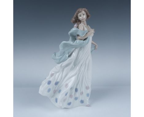 Glossy figural in flowing gown with sage colored shawl holding a sweet bird. Lladro backstamp. This item has its original box