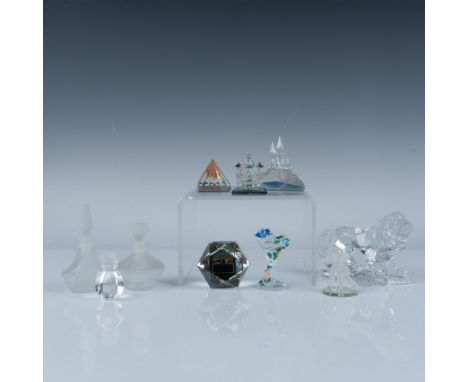 This stunning collection features a variety of unique pieces, including a clear crystal bird bath adorned with ceramic flower