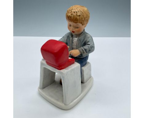 Matte porcelain. Features an adorable boy doing homework on his computer. Signed Frobek. Goebel Hummel Today's Children backs