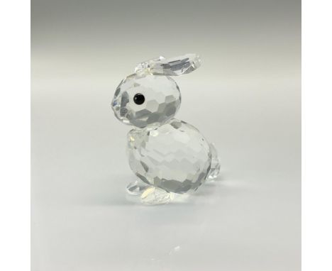 The mini sitting rabbit is made from clear crystal, and has black eyes. Swarovski etched backstamp. This item has its origina
