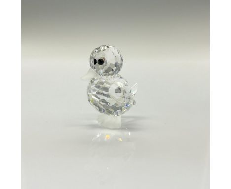 Baby chick has a clear cut crystal body, frosted bill and feet and black eyes. This item has its original box which measures 
