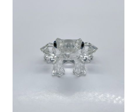Part of the In The Secret Garden collection. A small clear crystal amphibian with black-green eyes. Swarovski swan mark. 1831