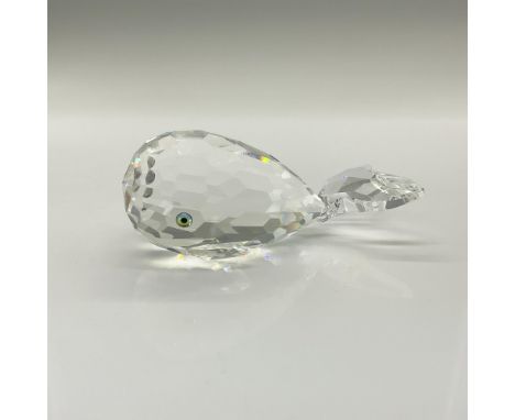 This cheerful crystal whale is made from clear crystal and has green/black eyes and a frosted mouth. This item has its origin