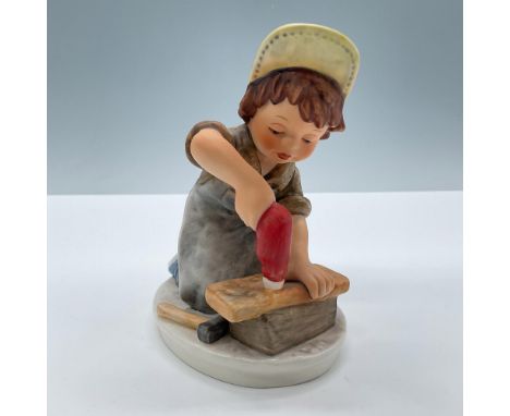 Matte porcelain. Features a little carpenter boy. Signed Frobek. Goebel Hummel Today's Children backstamp. Issued: 20th centu