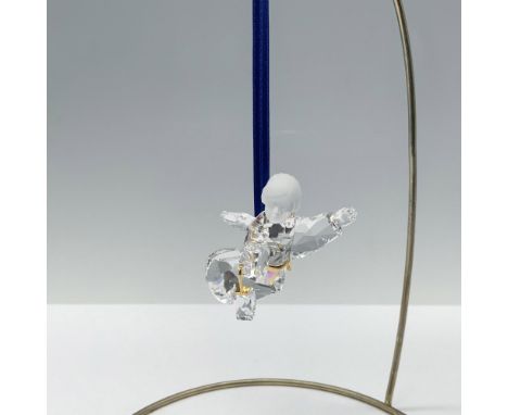 Limited edition clear faceted crystal angel with a frosted head that is holding a lantern. This item was part of the Crystal 