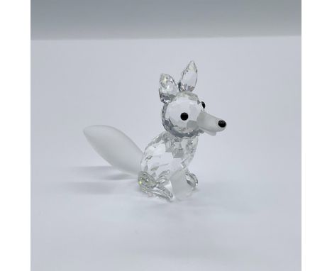 Part of the Woodland Friends collection. A clear crystal seated fox with black eyes and nose. Frosted crystal front legs, tai