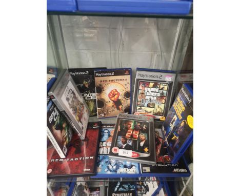 Shelf of PlayStation 2 games. 