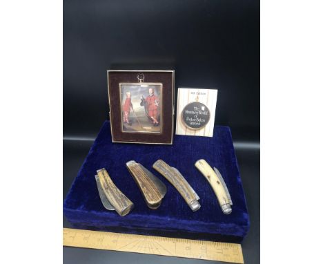 Boxed portrait together with collection of ornate Swiss style knifes.    