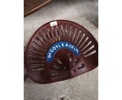Wm Doyle cast iron tractor seat. 