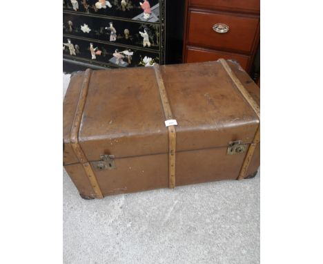Stunning 19th century leather trunk with wooden bounding. 