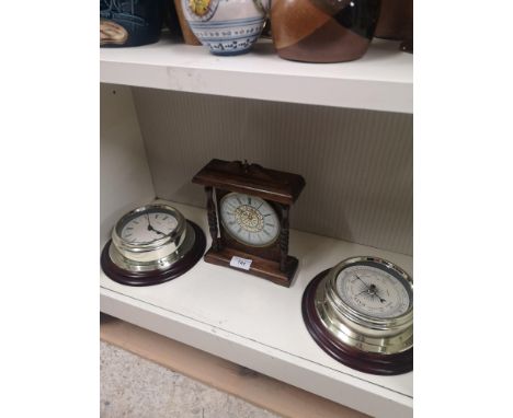 2 clocks together with barometer. 