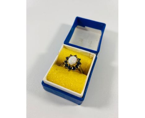 Gold on silver ring Hall Marked with sapphire and opal. size R. 2.7gr 