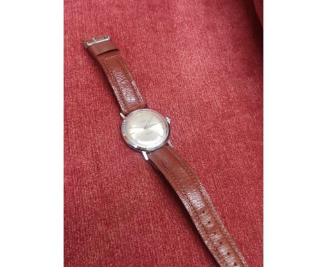 British made timex watch with brown leather strap. 