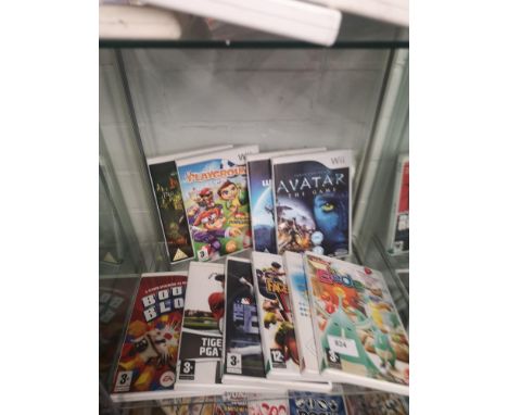 Shelf of ninetendo wii games. 