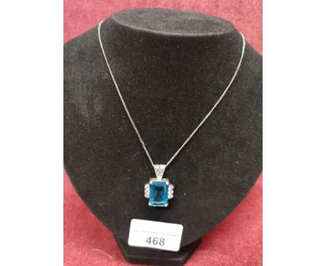 Stunning silver necklace set in light blue stone. 