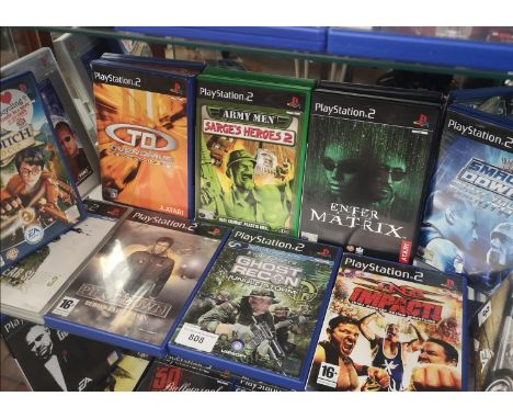 Shelf of PlayStation 2 games. 