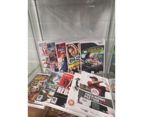 Shelf of Nintendo wii games. 