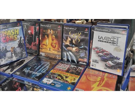 Shelf of PlayStation 2 games. 
