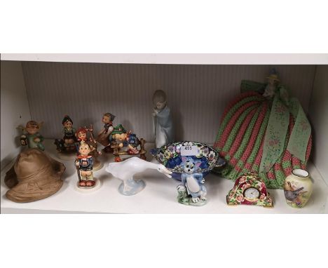 Shelf of collectables to include hummel, wade Tom figure victorian doll etc. 