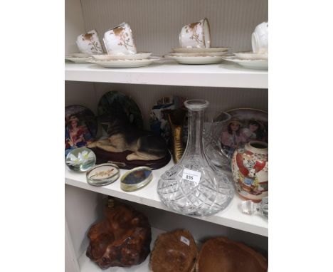 Large shelf of collectables to include Chinese vase , crystal decanter with stopper collector plates , dog figure etc . 