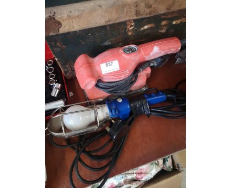 Sander together with workers garage light. 