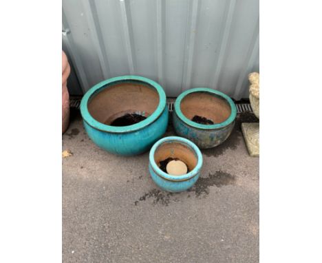 Set of three glazed garden planter largest measures approximately 13 inches tall