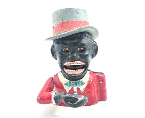 Vintage cast iron novelty money box measures approx 7 inches tall Notice from the the-saleroom.com: These items are listed on