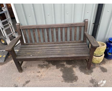 Wooden garden bench measures approximately 35 inches tall, length 63 inches