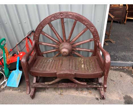 Wooden novelty wagon wheel garden bench measures approximately Height 49 inches, Length 48 inches