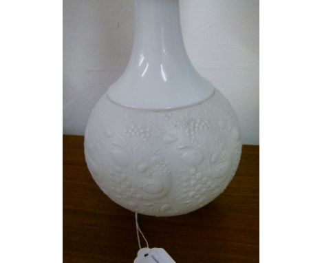 Pair of Rosenthal glazed and bisque porcelain relief moulded table lamps, having relief moulded stylised foliate decoration w