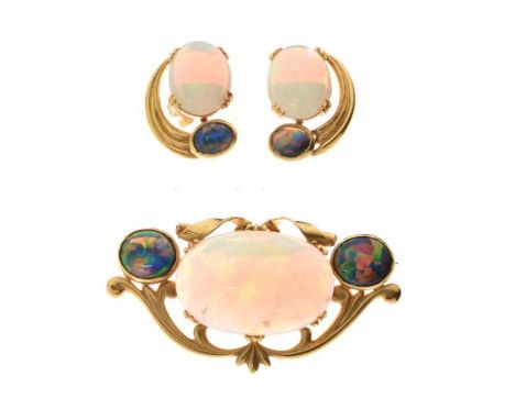 Black opal and opal brooch and earrings set, stamped '22ct' and 'E.H. Staines', probably Australian, the scroll work framed b