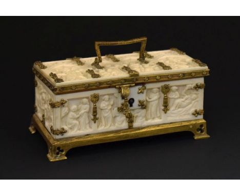 French Gothic Revival gilt metal-mounted carved ivory casket or coffret, the lancet-arched lid panels and side panels all dec