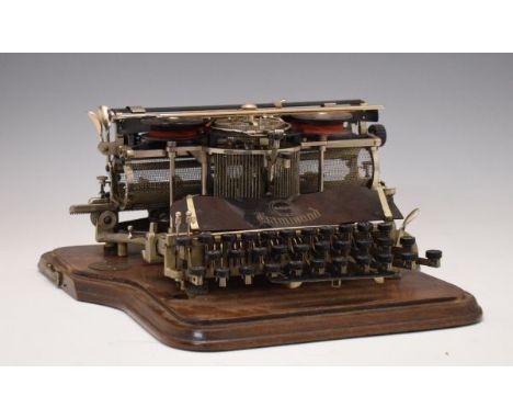 Early 20th Century oak-cased Hammond Multiplex typewriter, with three registers of keys over spacebar, in bull-nose case insc