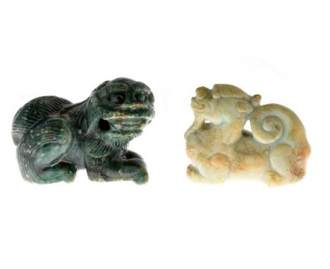 Chinese carved celadon jade figure of a Kylin (Qilin), 5.3cm long x 4.2cm high, together with a dark green-stained carved soa