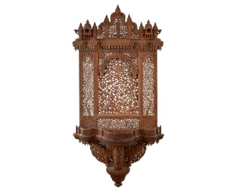 Late 19th /early 20th Century Indian carved teak wall bracket, finely carved with architectural towers over a pierced rectang