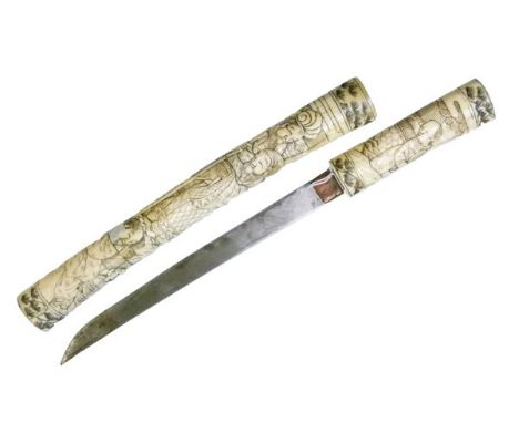 Japanese bone dagger (tanto), 29cm flat single edged blade with brass habaki, bone handle carved with figures against a lands