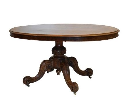 Victorian inlaid figured and burr walnut oval loo or centre table, the quartered oval top with boxwood foliate scroll inlaid 