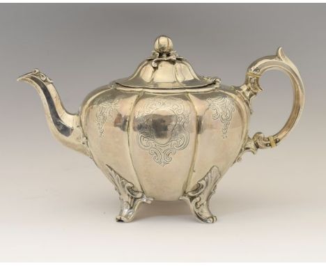 William IV silver teapot, of lobed form standing on four splayed decorative feet, sponsors mark for Edward. Edward Junior. Jo