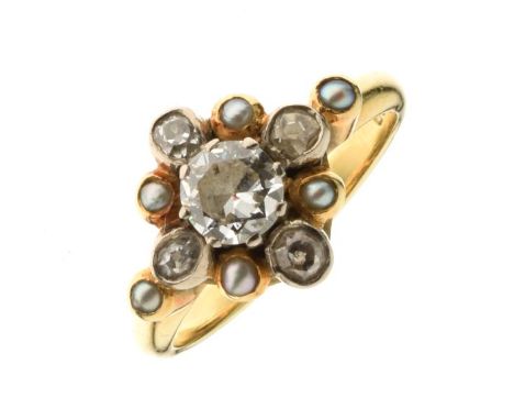Diamond and seed pearl cluster 18ct gold ring, the central brilliant cut of approximately 0.37 carats, with old brilliant cut