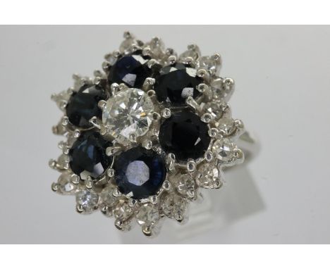 18ct white gold diamond and sapphire set ring, size J, 7.1g, approximately 0.5cts diamond, ring head D: 18 mm. P&amp;P Group 