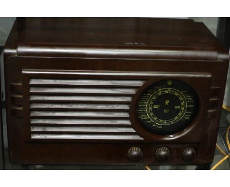 Radio Rentals Bakelite radio in good condition. All electrical items in this lot have been PAT tested for safety and have pas