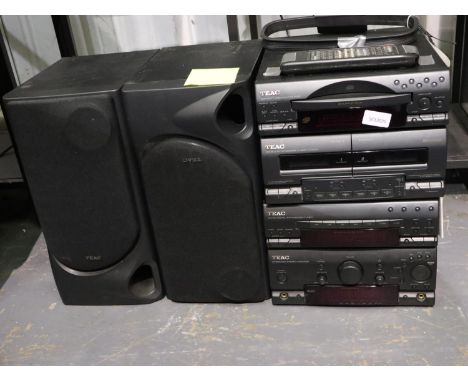 TEAC digital compact hi-fi stacking system with two speakers and remote. All electrical items in this lot have been PAT teste